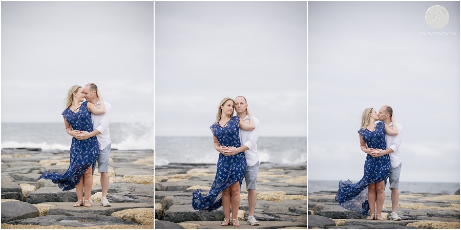  couple on jetty in Asbury Park engagement session jersey shore 